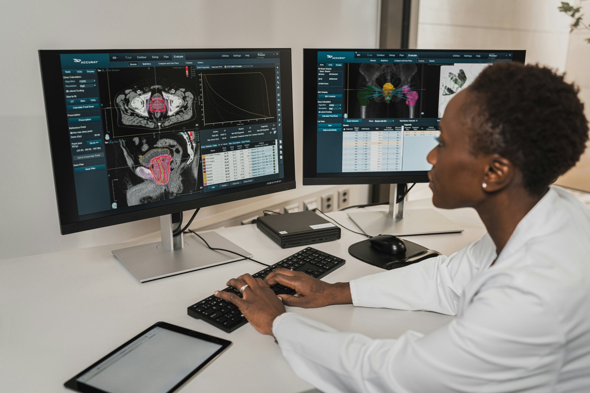 A radiology reading room with AI decision support across multiple diagnostic monitors